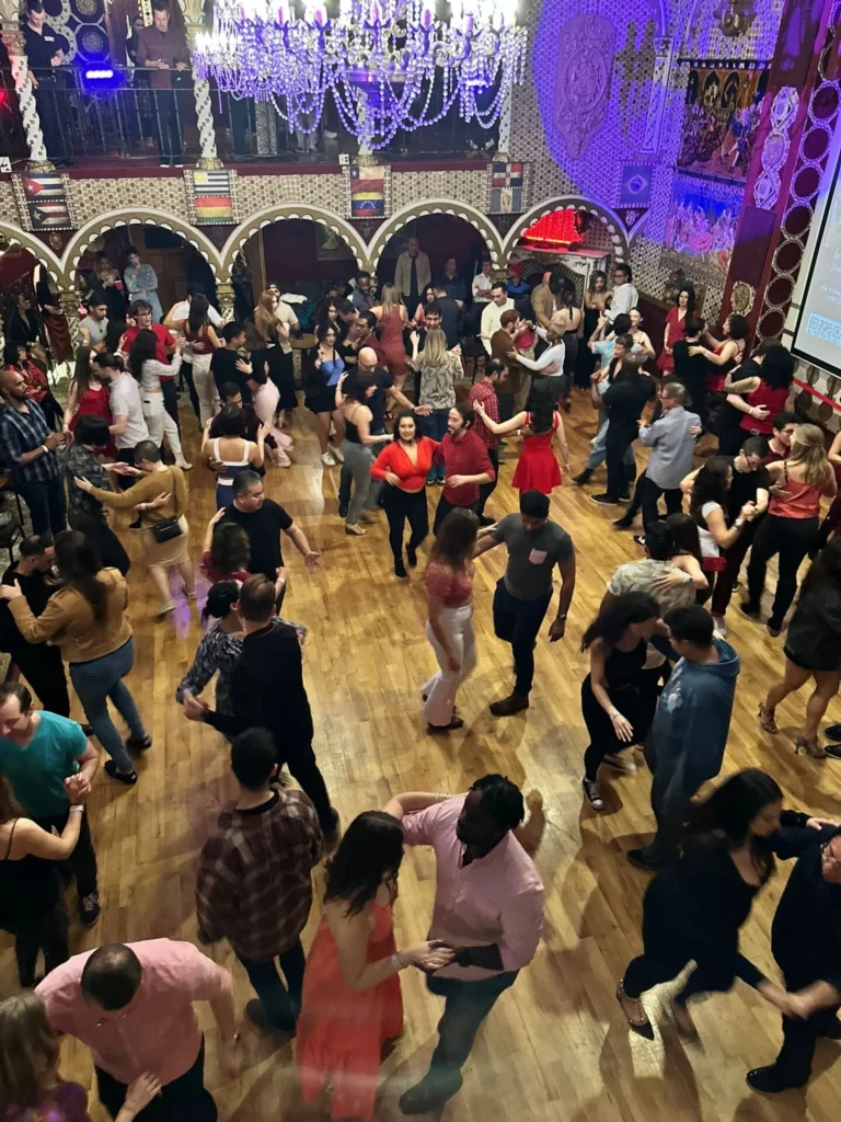 People enjoying Salsa and Bachata dancing with Melómano in San Diego