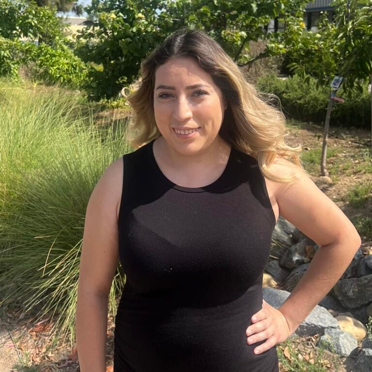 Photo of Ashley, Dream Team Member, posing in nature